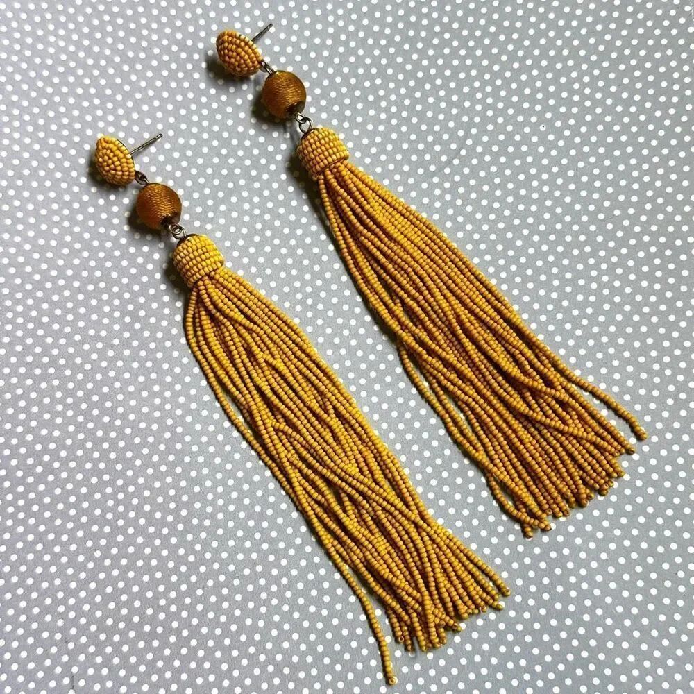 Long yellow beaded tassel earrings